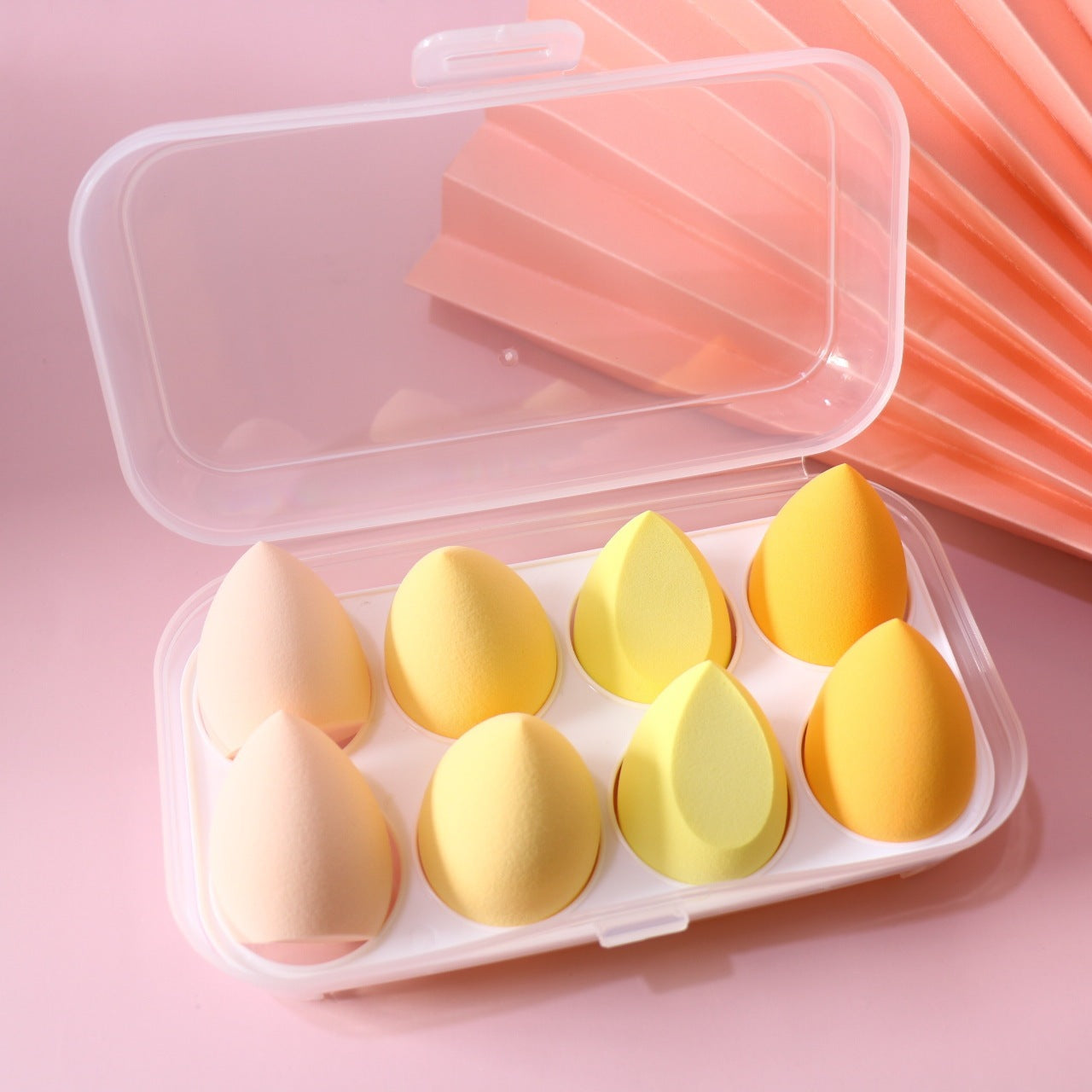 close up egg-yolk makeup powder puffs